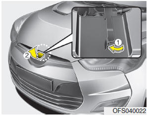 2. Go to the front of the vehicle, raise the hood slightly, pull the secondary