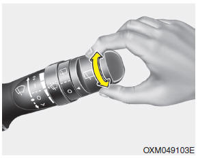 The rear window wiper and washer switch is located at the end of the wiper and