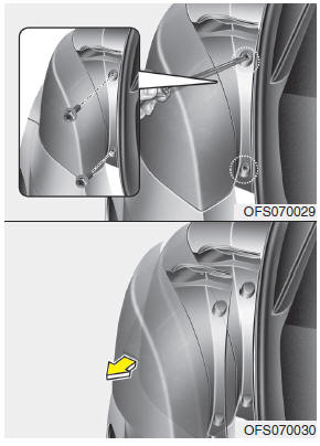 1. Open the tailgate. 2. Loosen the outside light assembly retaining screws